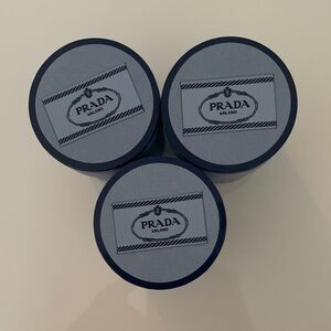 Prada Round Logo Boxes — Navy and Light Blue. Used to store Twillys. Set of 3
